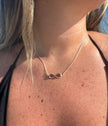Collana con ciondolo infinito