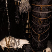 Gold Tethered Remains Bones Necklace