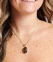 Collana con pendente etereo verde