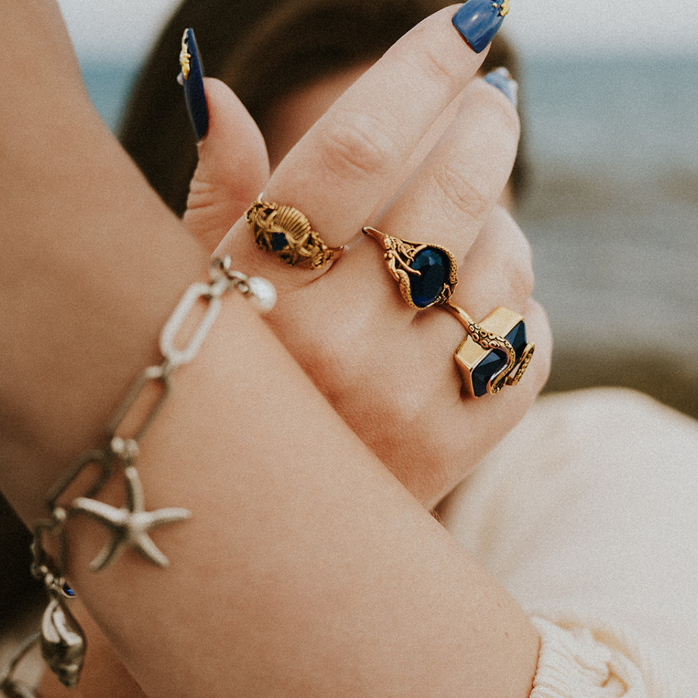 The Siren’s Secret Blue Stone Gold Ring