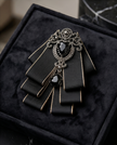 Bold Black Ribbon Bow Tie with Statement Gemstone Brooch