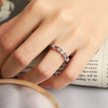 Eternity-ring med lavendel-ametyst i smaragdslibning i sterlingsølv