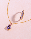 Anillo de media eternidad de rubí rosa y amatista talla pera en vermeil de oro de 18k