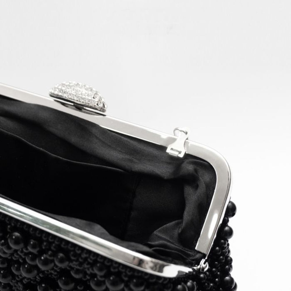 Pochette con perle nere e cristalli con dettagli argentati