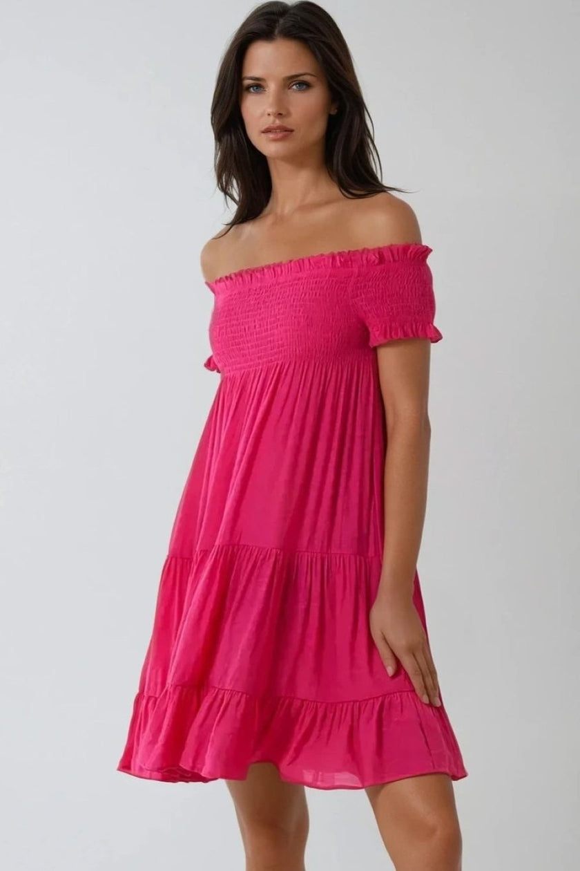 Miniabito fucsia scollo alla Bardot con arricciature