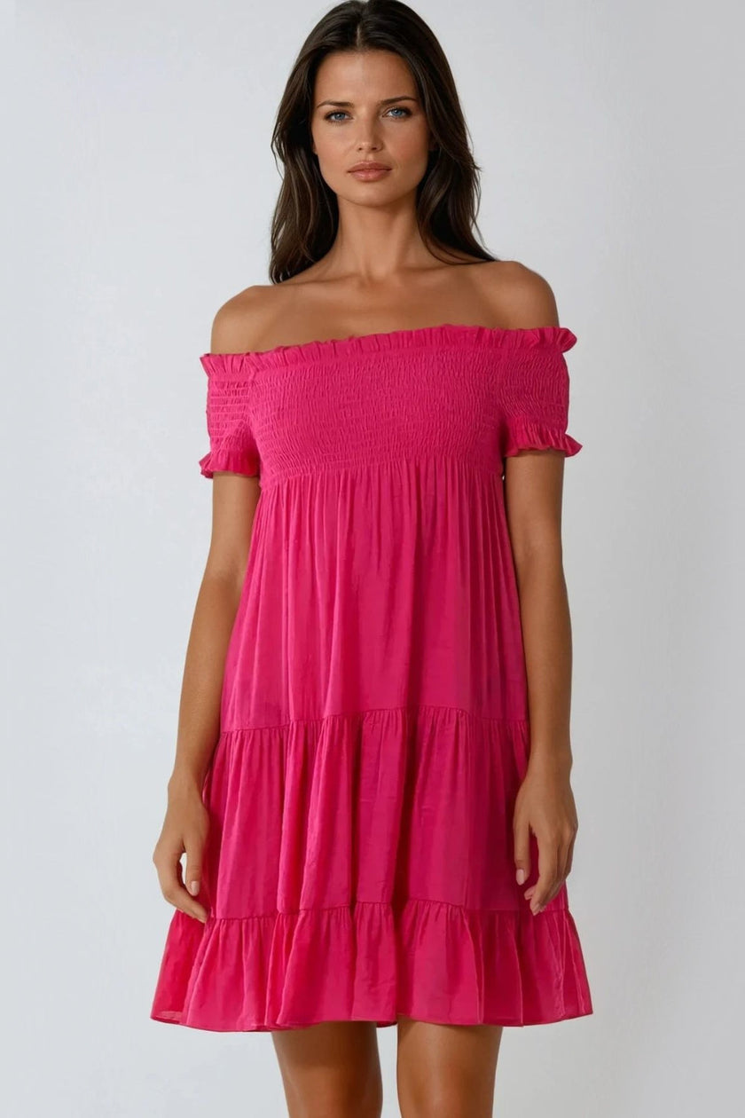 Miniabito fucsia scollo alla Bardot con arricciature