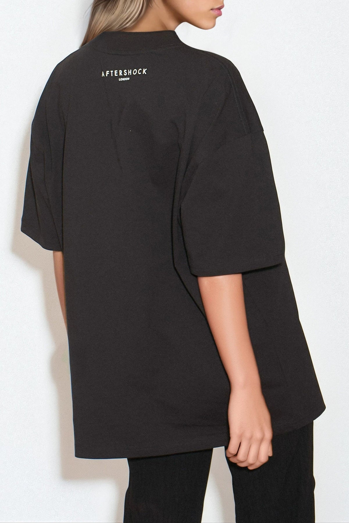 Oversized t-shirt i bomull med svart logotyp