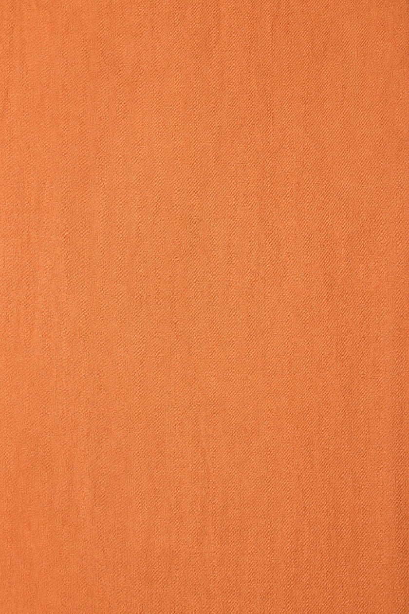 Scialle in pashmina color ruggine con nappine di perline