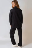 Ensemble pull à col roulé et pantalon en maille noir