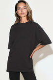 Oversized t-shirt i bomull med svart logotyp