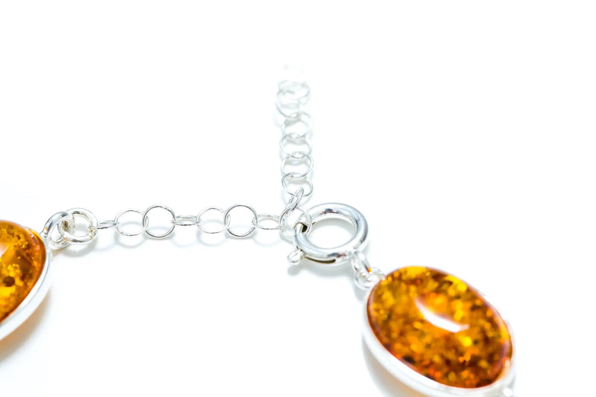 Bracciale a dichiarazione in ambra con filigrana alternata