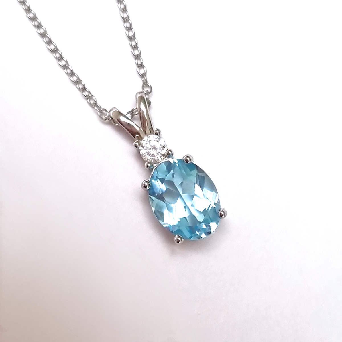 Blue Topaz Pendant Necklace in Sterling Silver