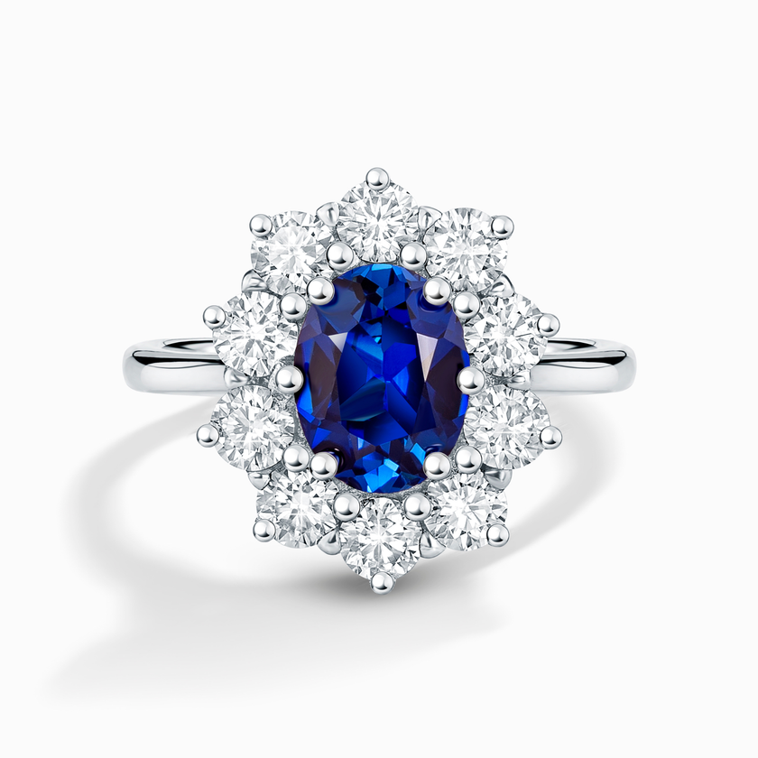 Blå safir halo forlovelsesring i sterlingsølv