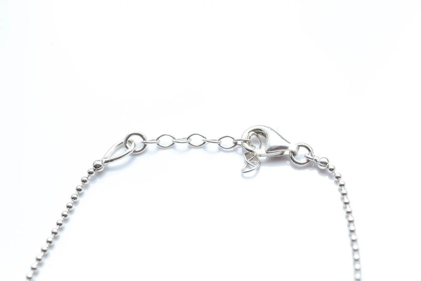 Bracciale decorativo con sfera in ambra e argento