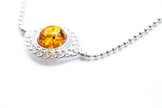 Bracciale decorativo con sfera in ambra e argento