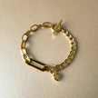 Bracciale con ciondolo a barretta Danni Luxe in oro 18k