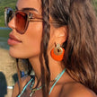 Lulu store statement-øreringe i terracotta-disk