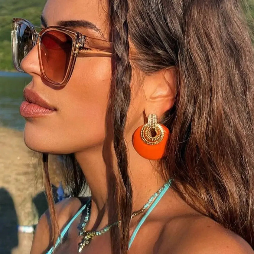 Lulu store statement-øreringe i terracotta-disk
