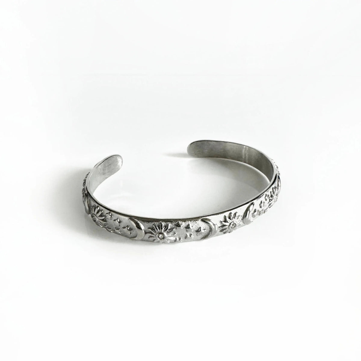 Bracciale rigido Helia Luxe color argento con motivi celestiali