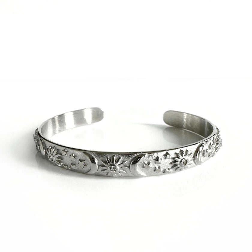 Bracciale rigido Helia Luxe color argento con motivi celestiali