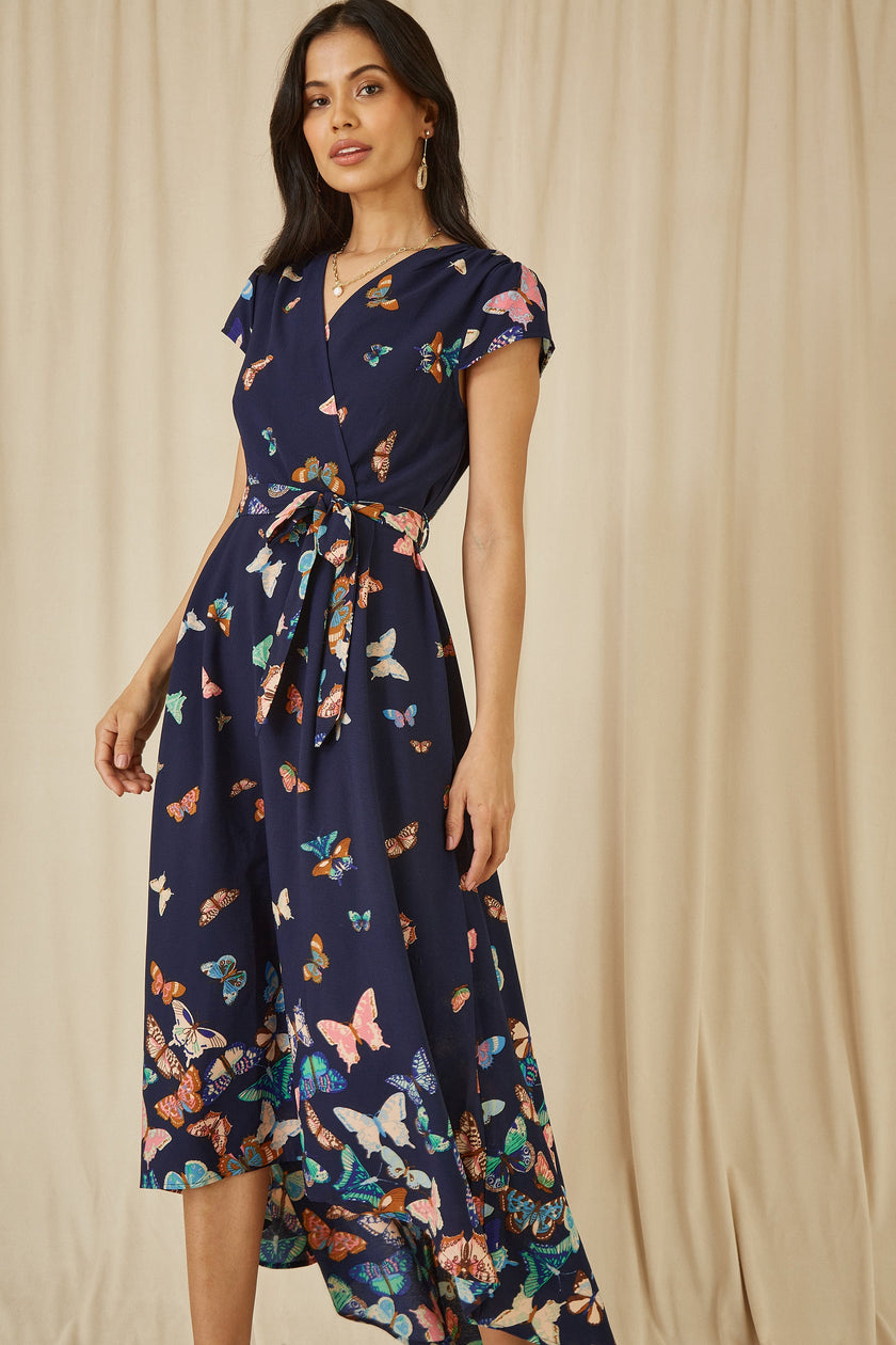 Yumi Navy Butterfly Print Dip Hem Midi Wrap Dress