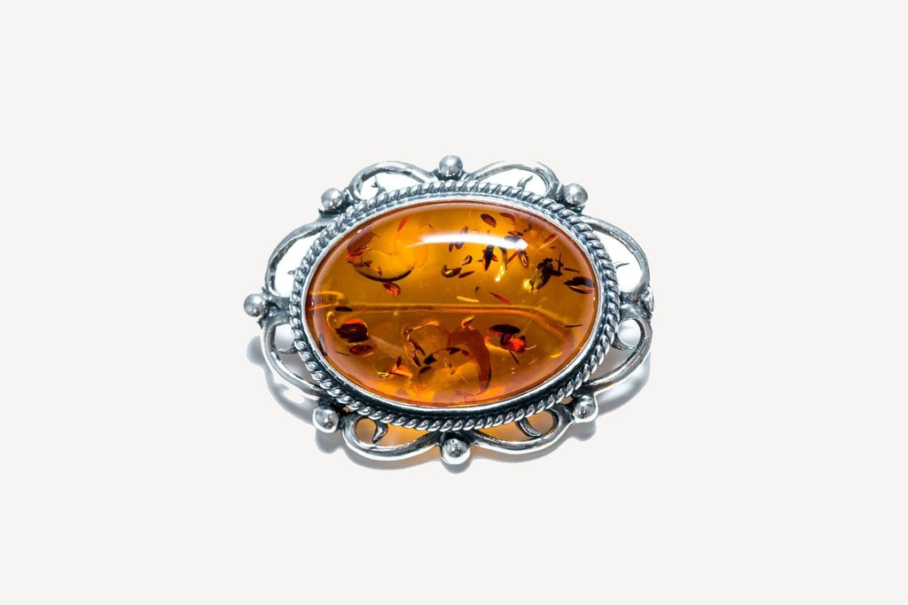 Oval Classic Framed Amber Brooch