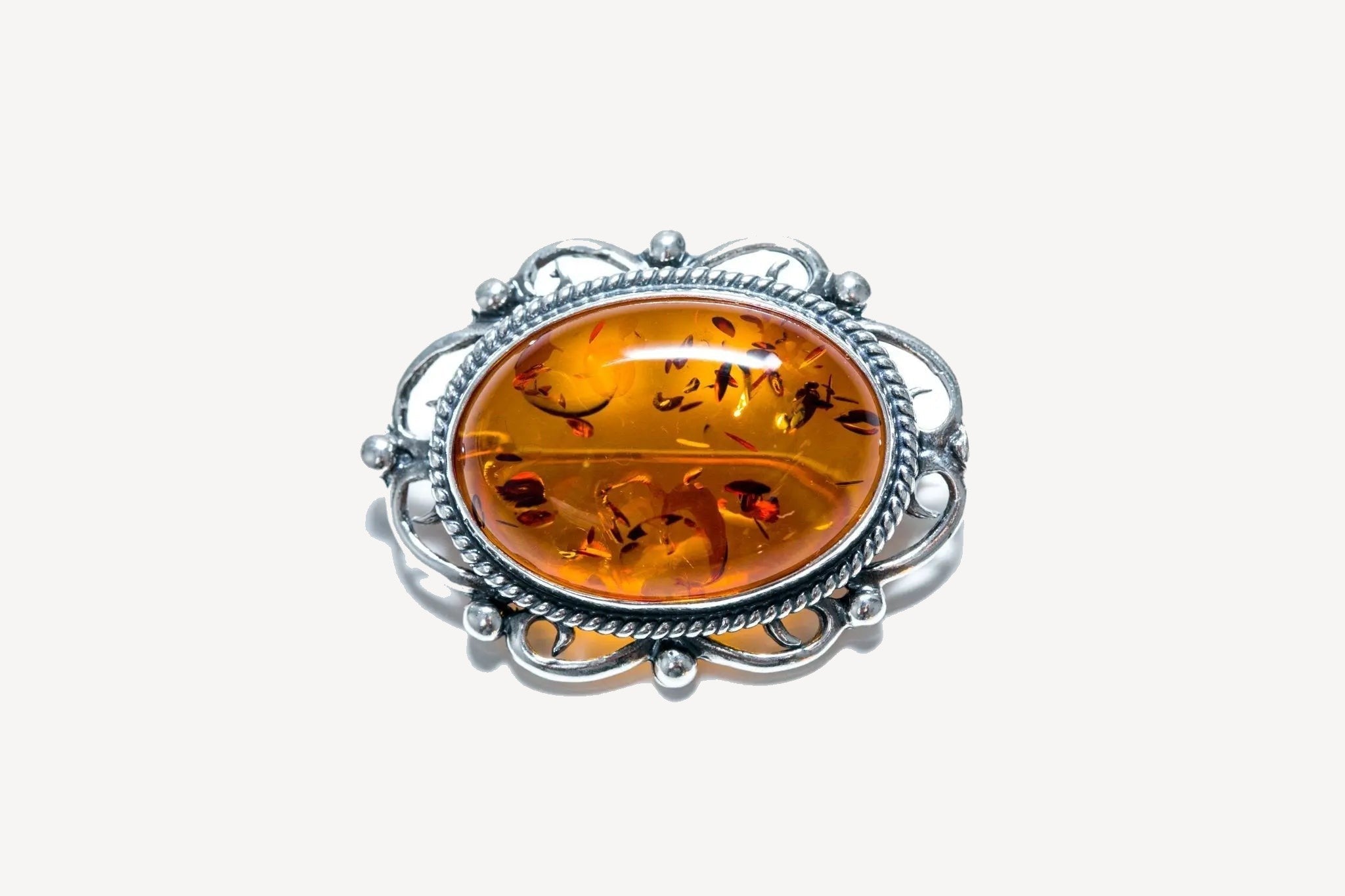 Oval Classic Framed Amber Brooch