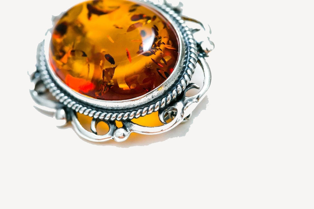 Oval Classic Framed Amber Brooch