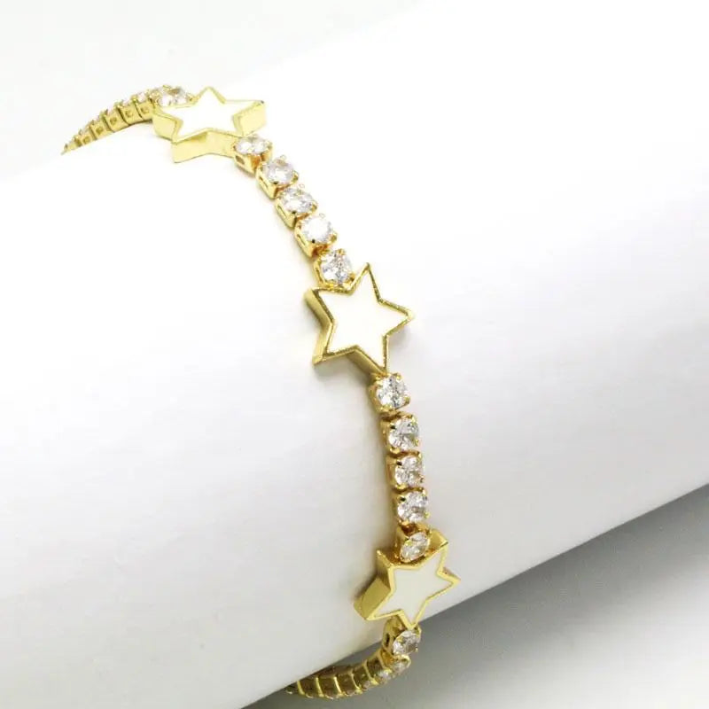 Pulsera Trella Luxe tipo tenis con estrellas bañada en oro de 18k