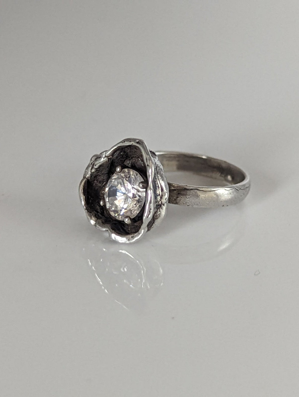 Silver Steed Large Zirconia in a Flower Silver Ring