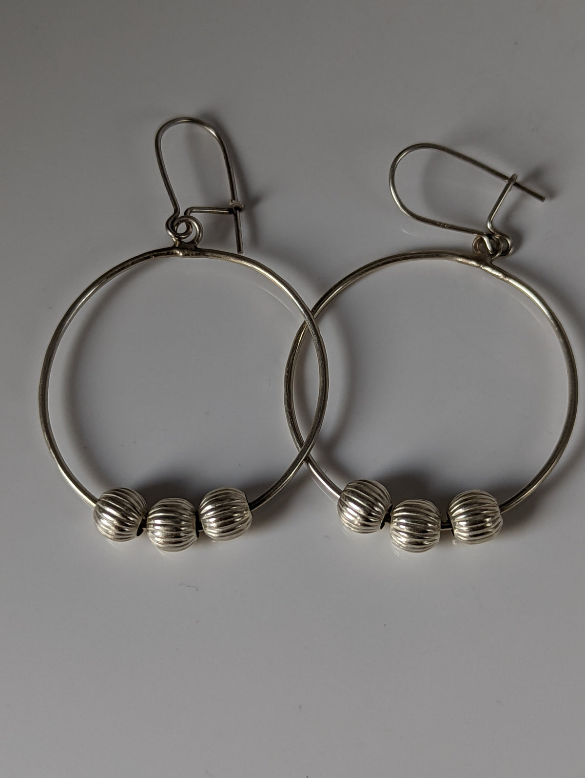 Silver Steed Loop with Buds Dangling Earrings