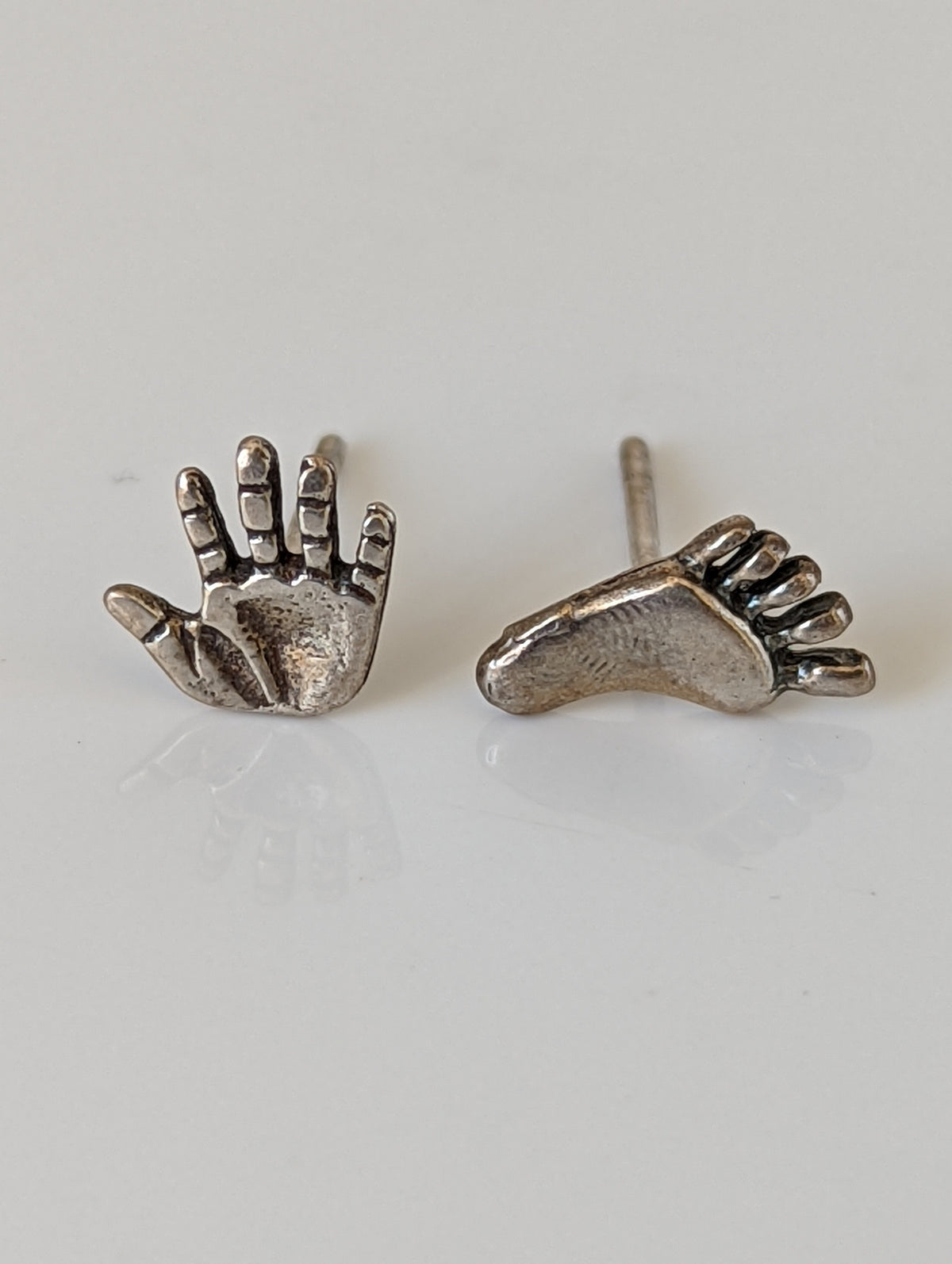 Silver Steed Hand and Foot Stud Earrings