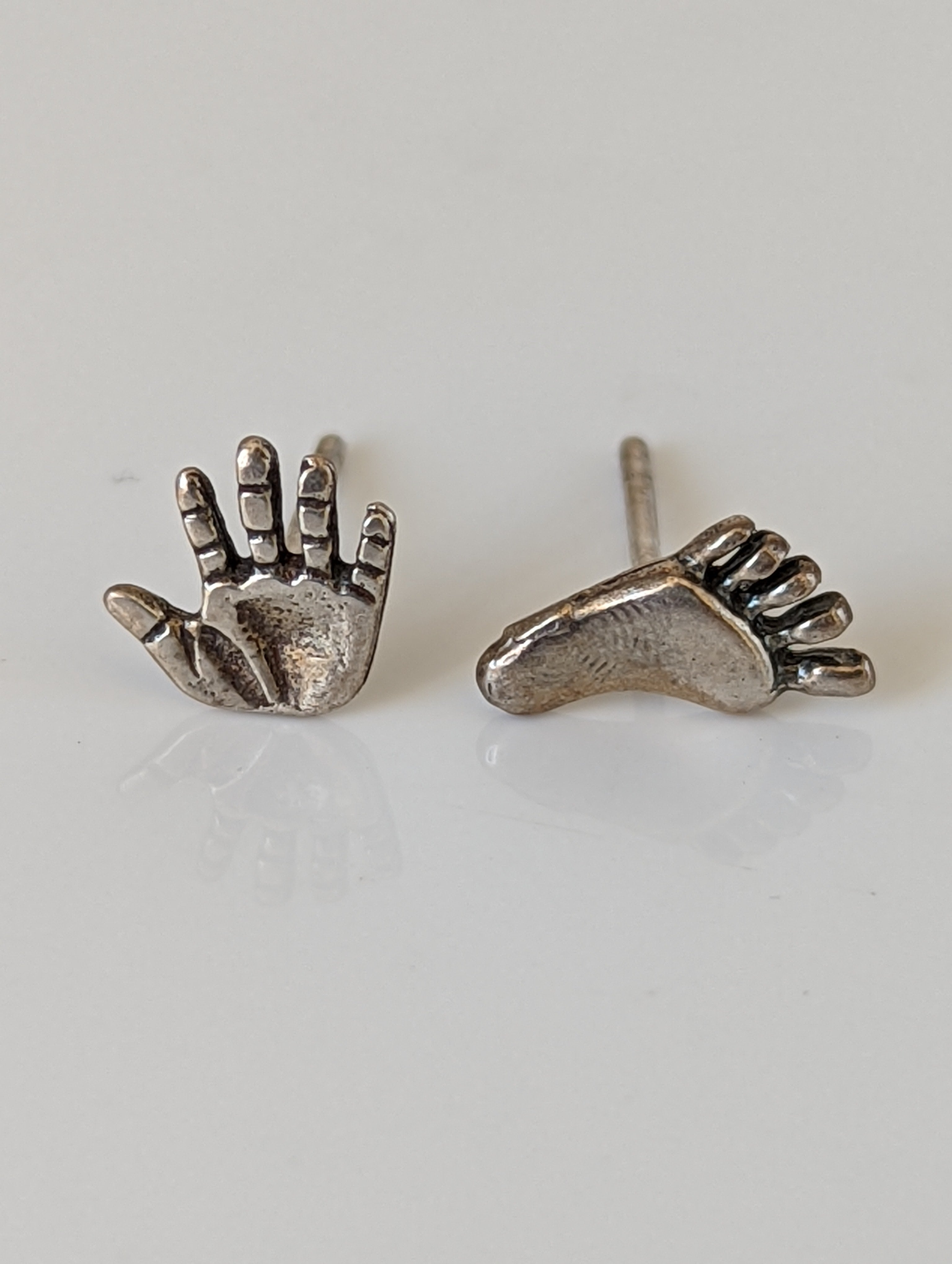 Silver Steed Hand and Foot Stud Earrings
