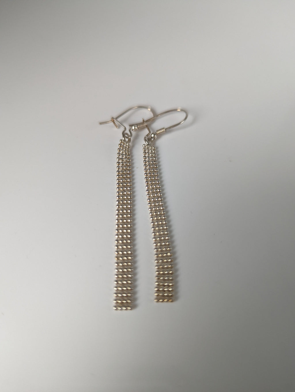 Silver Steed Curtain Dropped Earrings