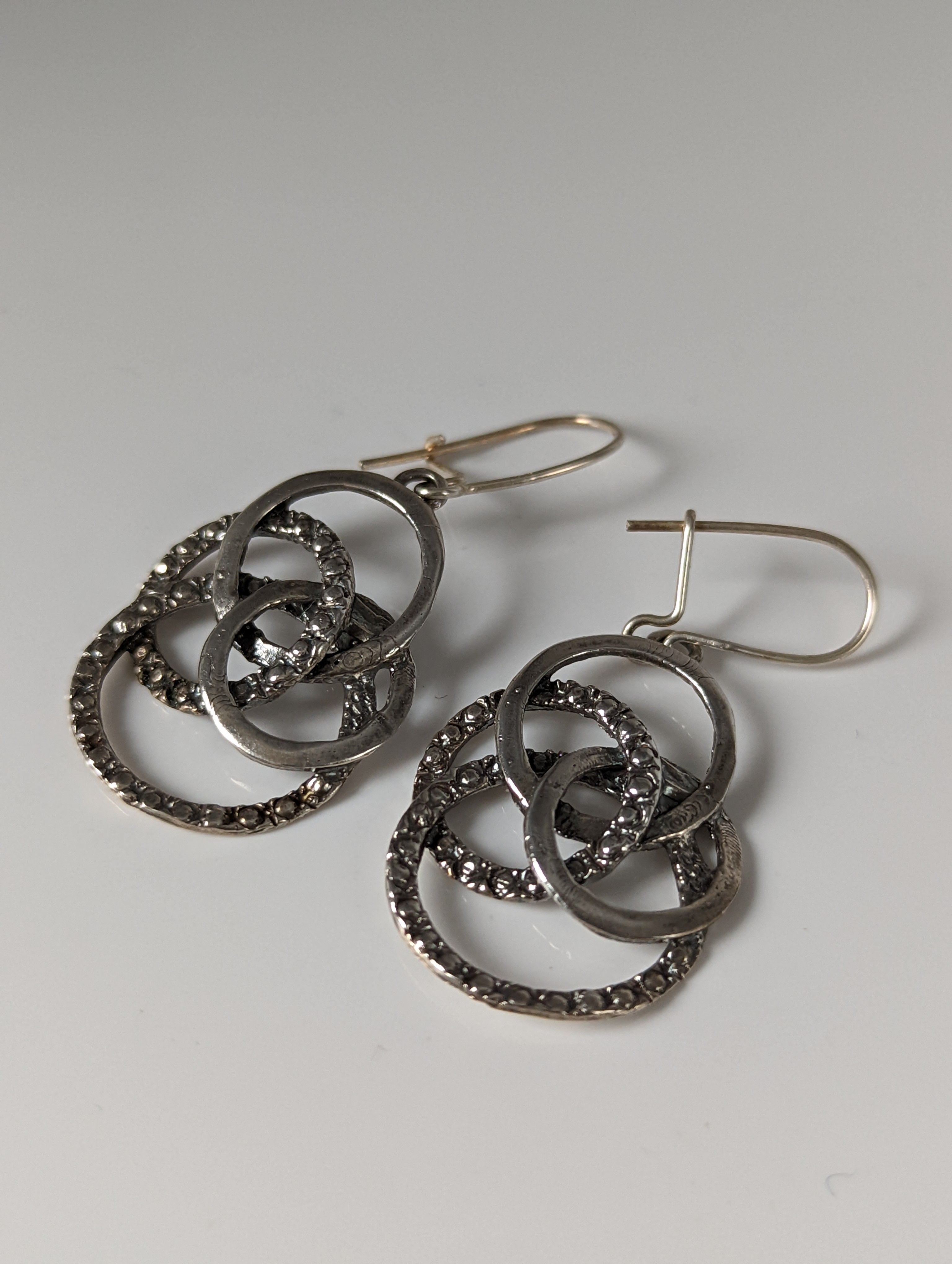 Silver Steed Linked Rings Dropped Earrings