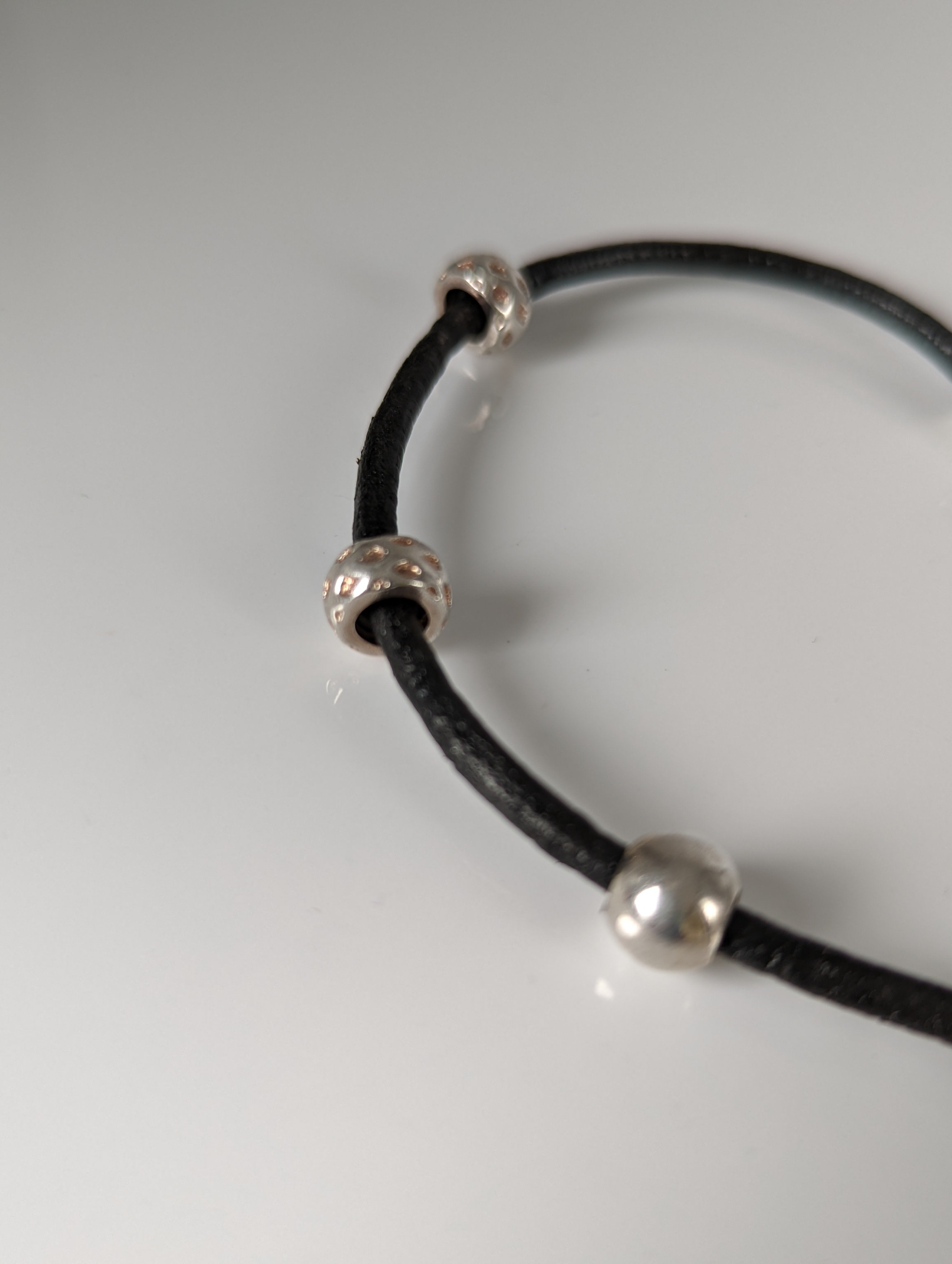 Silver Steed Silver Charms on Leather Cord Bracelet