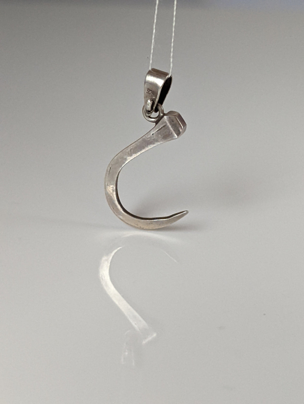 Silver Steed Curved Horseshoe Nail Silver Pendant