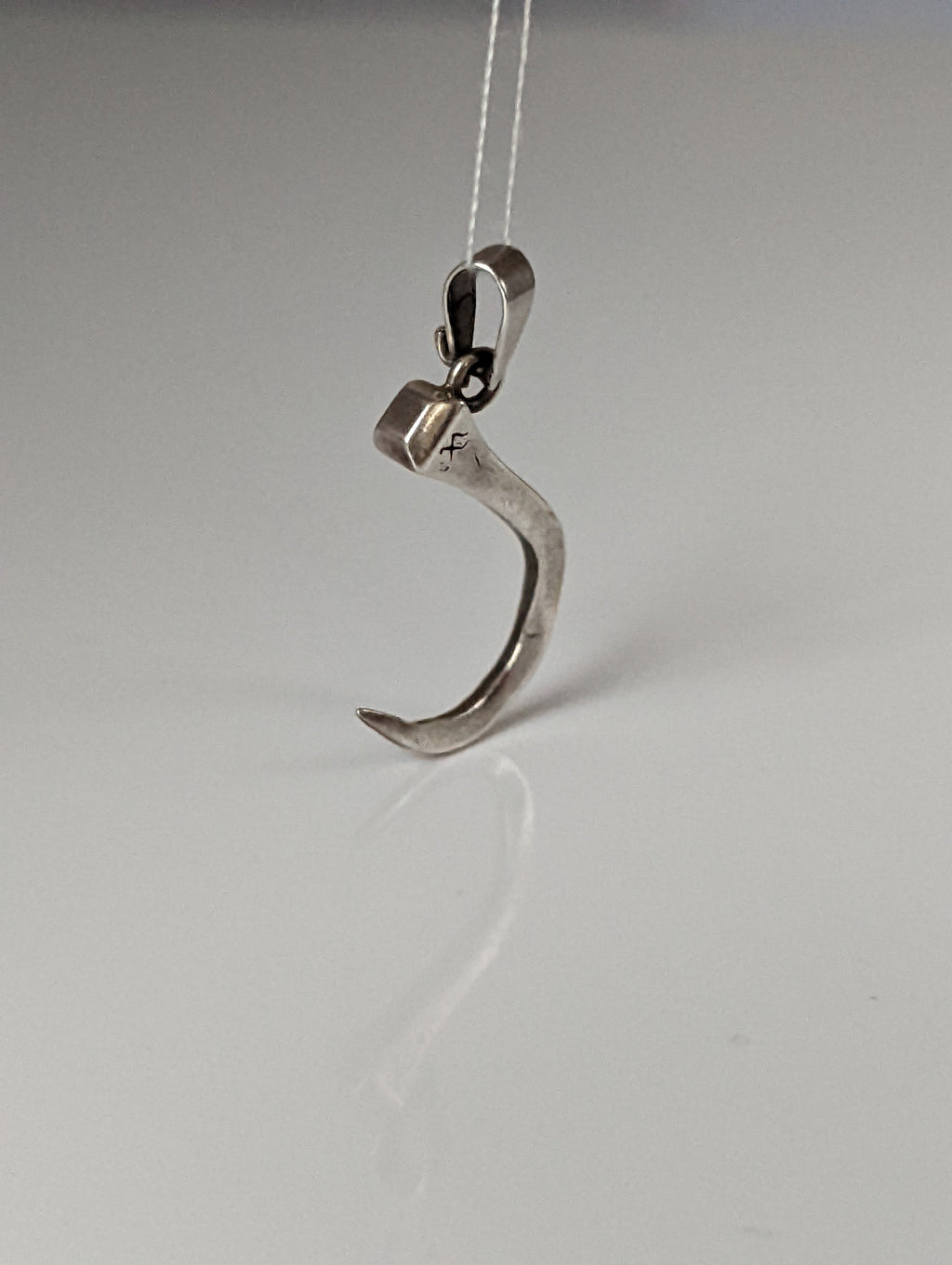 Silver Steed Curved Horseshoe Nail Silver Pendant