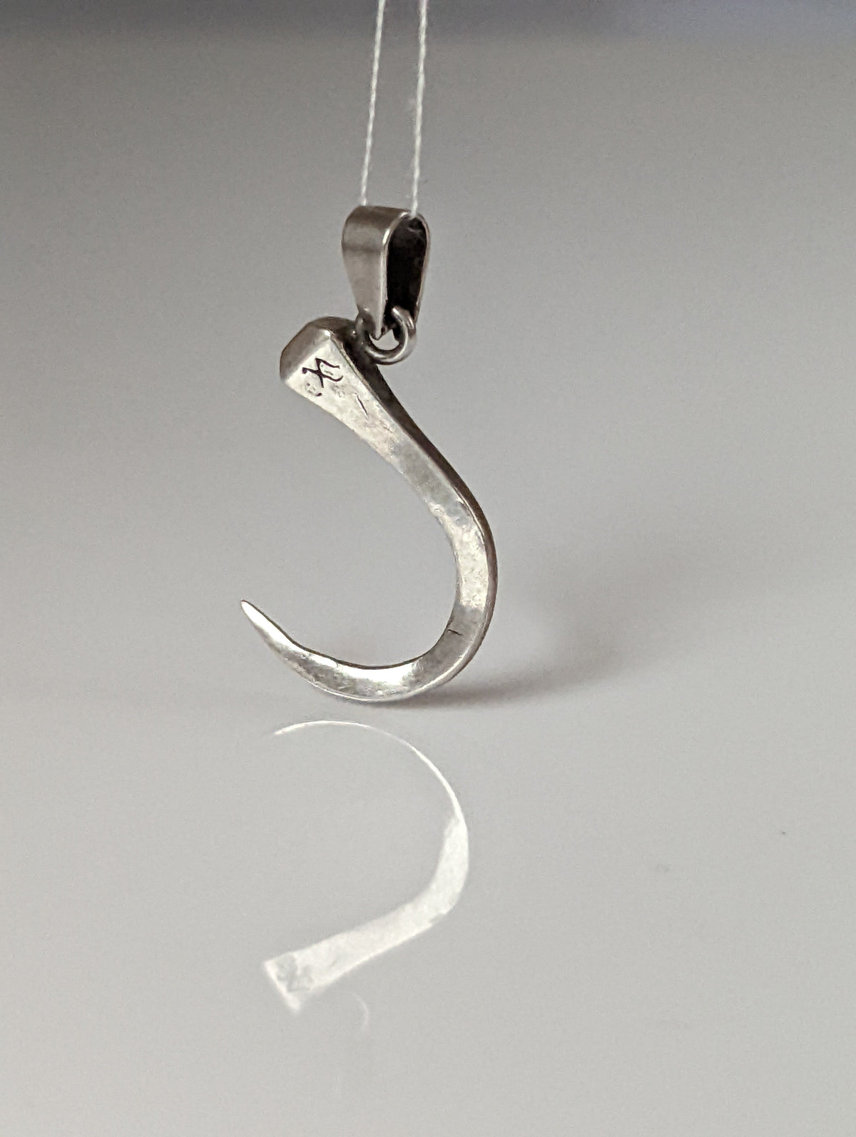 Silver Steed Curved Horseshoe Nail Silver Pendant