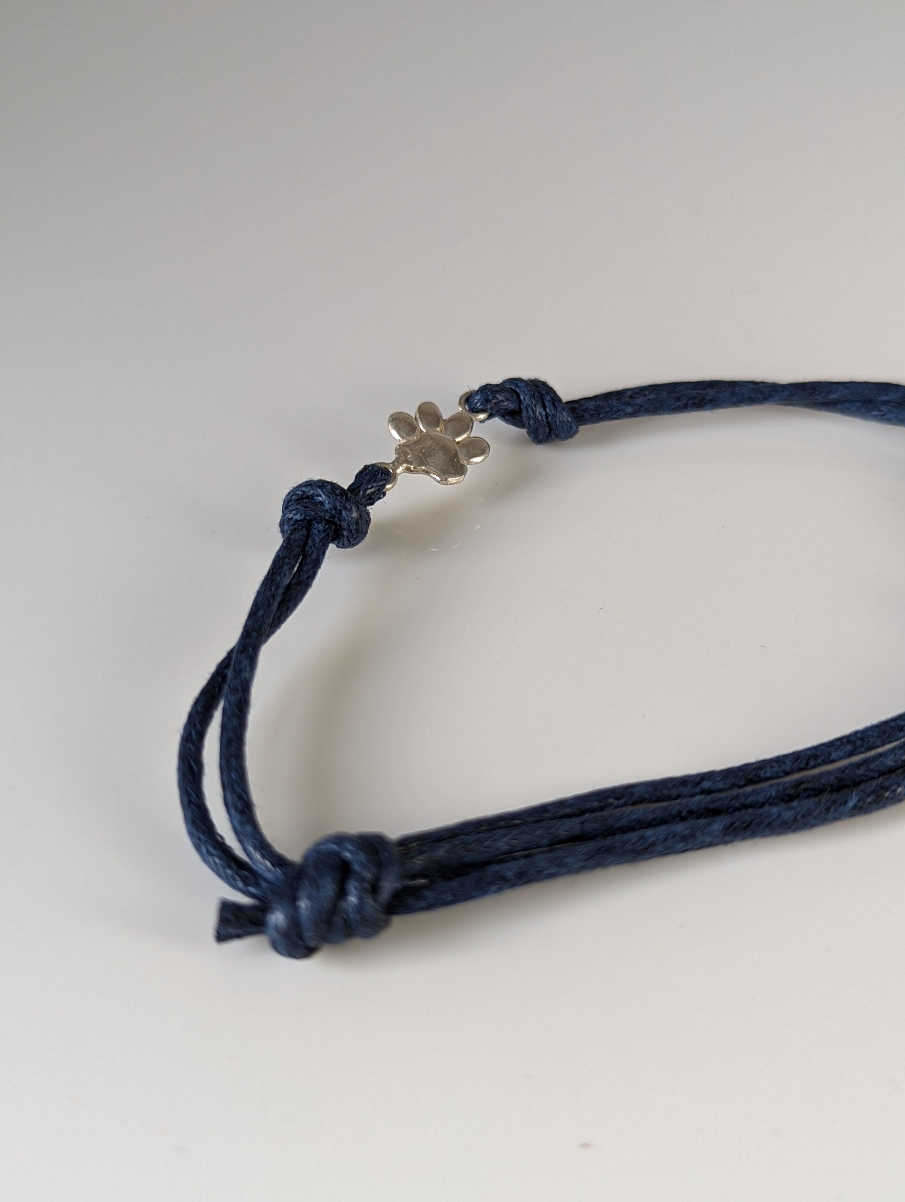 Silver Steed Paw Print Cord Bracelet