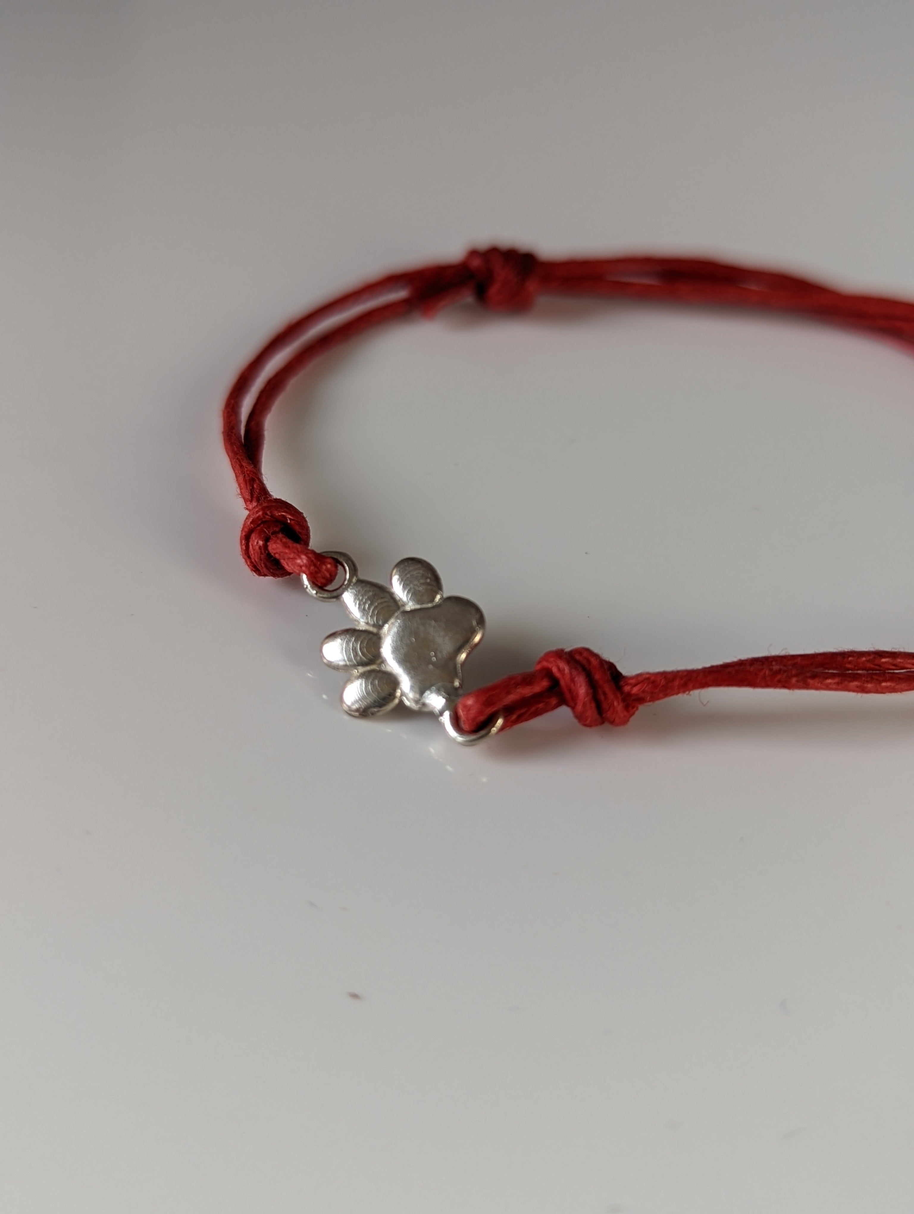 Silver Steed Paw Print Cord Bracelet