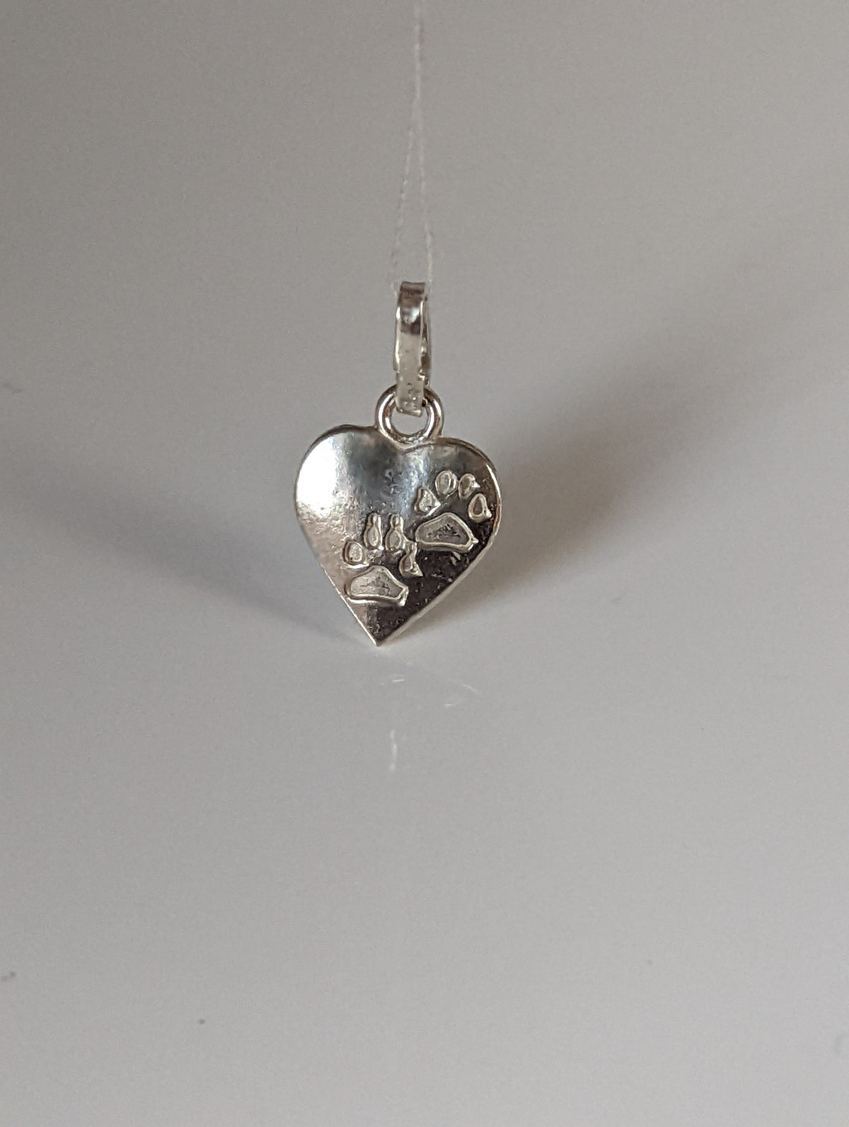 Silver Steed Paw Print on Heart Silver Pendant