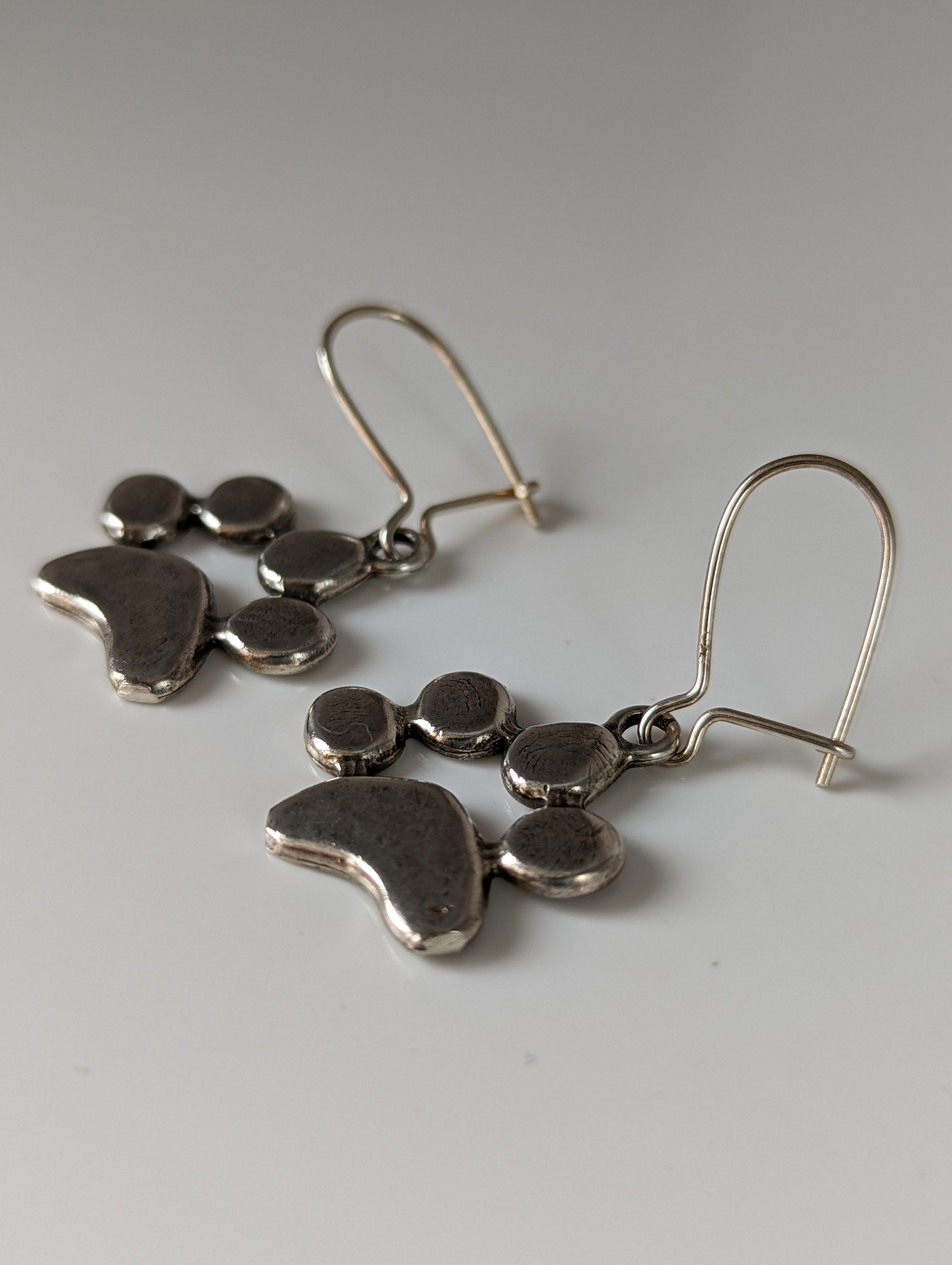 Silver Steed Paw Print Silver Dropped Earrings