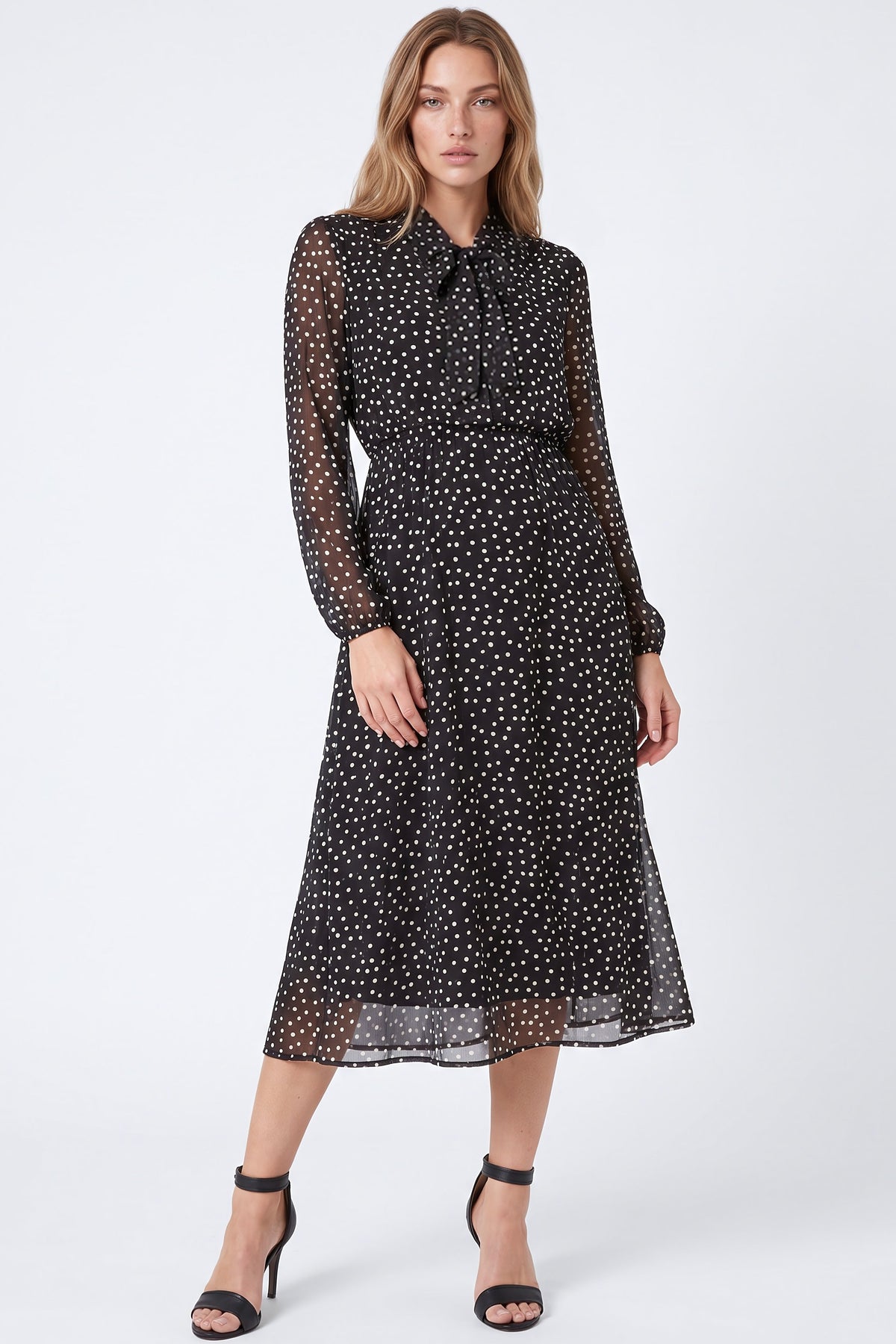 Vestido midi negro de lunares