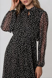 Vestido midi negro de lunares