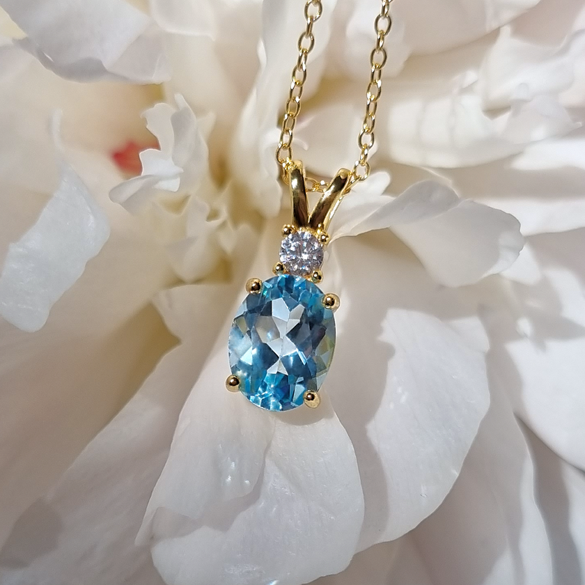 Set di gioielli Essential con topazio blu in argento sterling placcato oro 18k