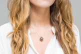 Collier médaillon en filigrane argenté