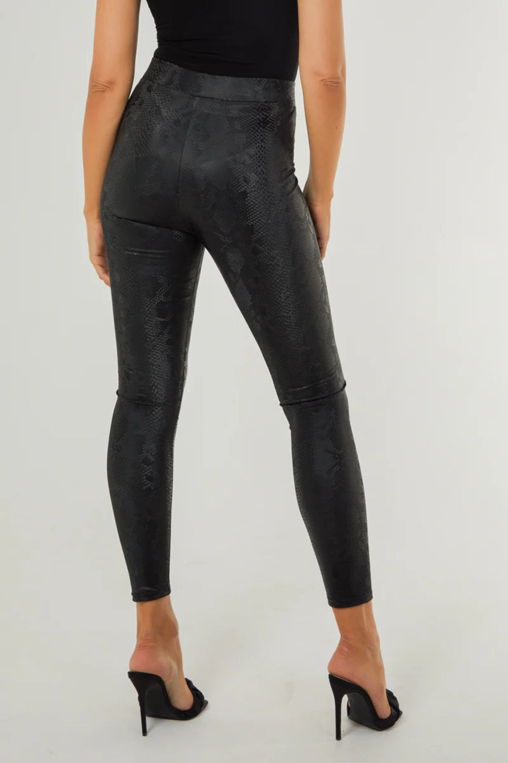 Legging met zwarte slangenprint en lederlook