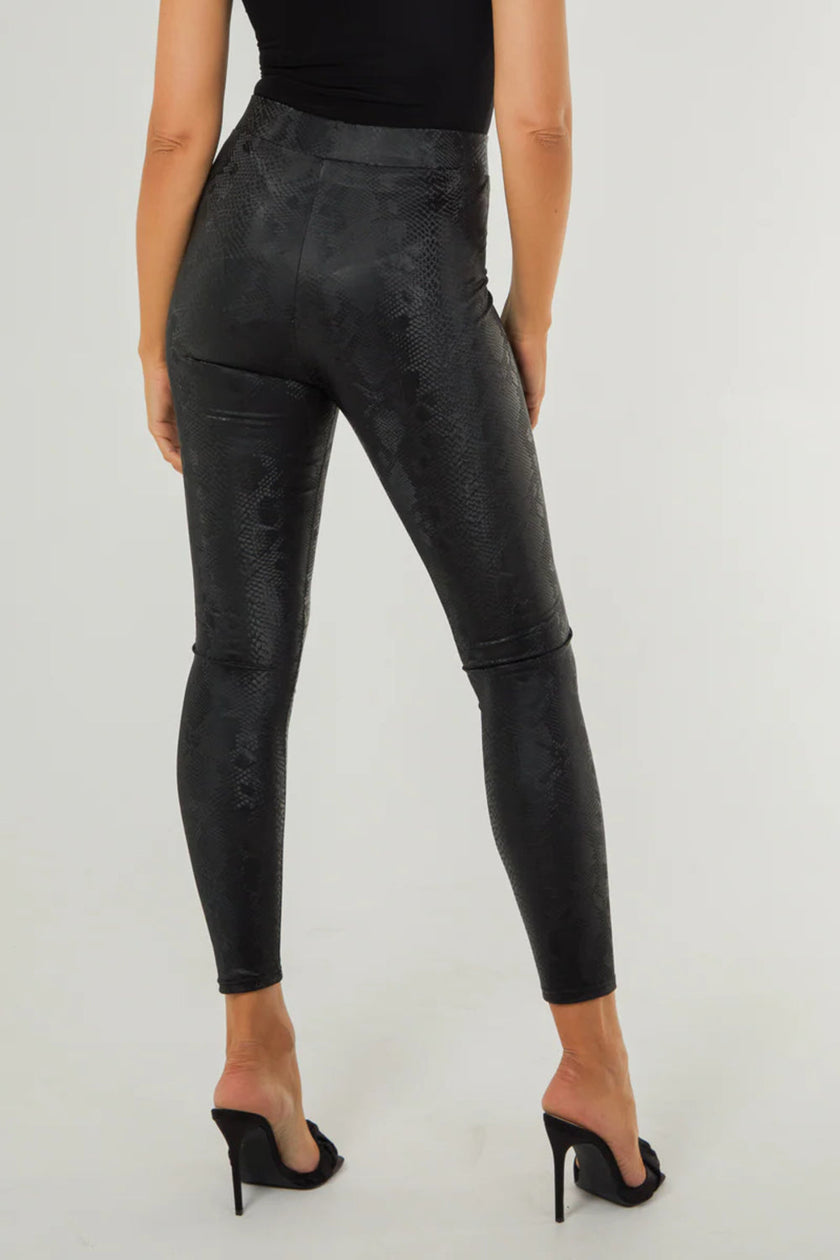 Legging met zwarte slangenprint en lederlook