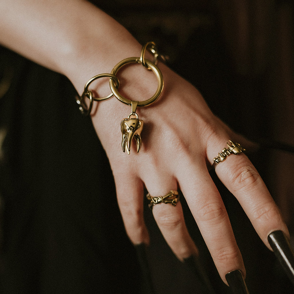 Gold Teeth Of The Taken Ring